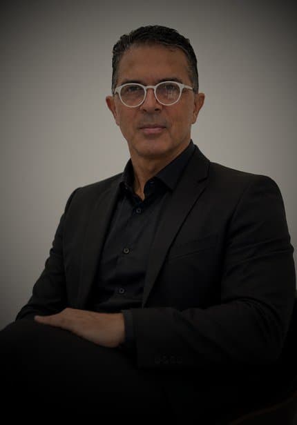 Prof. Sammy Oliver in a blazer portrait